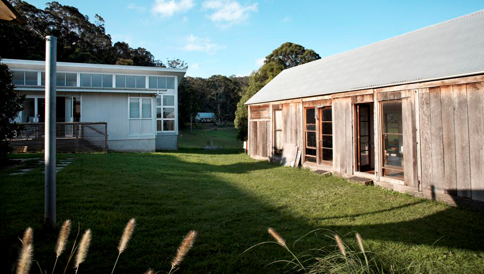 Residency: A photo from 2017 of buildings at the Bundanon Trust with grass in the foreground. Photo by Keith Saunders